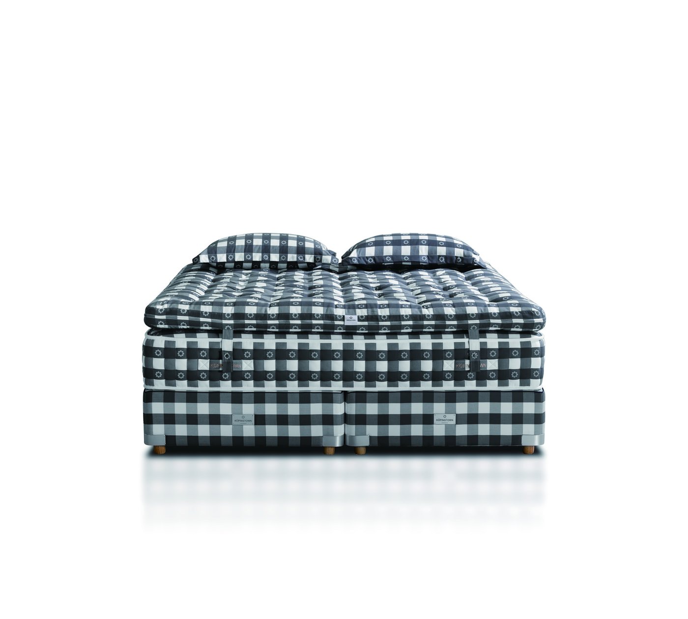Handcrafted KÖPINGTOWN mattress with hand side-stitched border and tufted surface