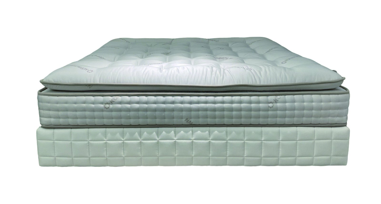 Handcrafted mattress detail with layered natural fillings