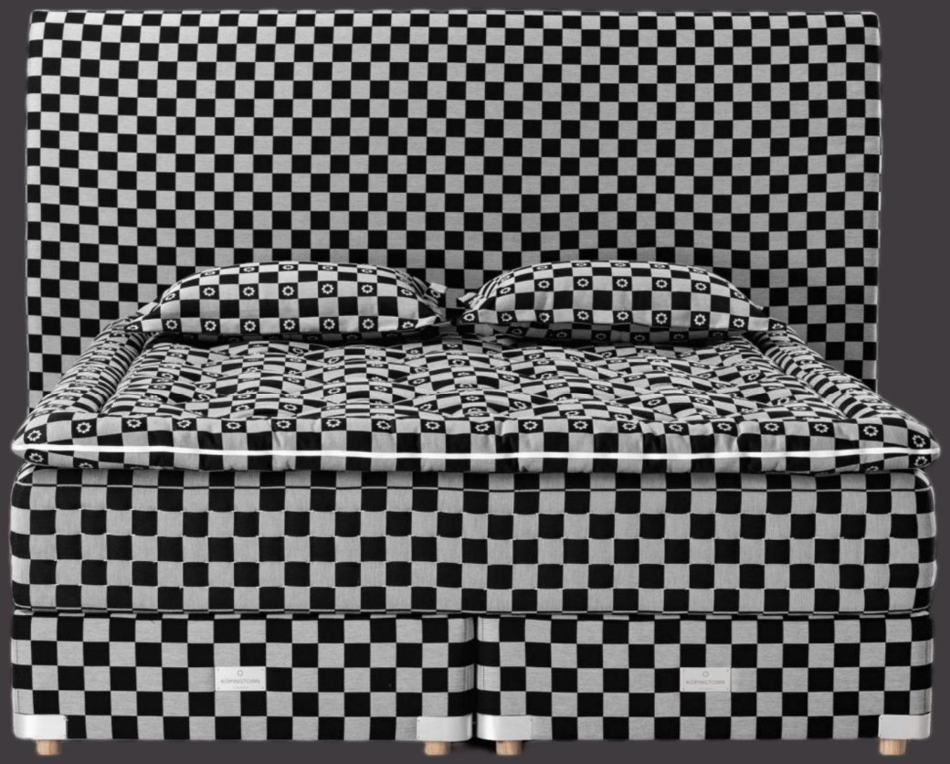 Stardust two-tier handcrafted mattress with tall headboard in black-and-white check fabric