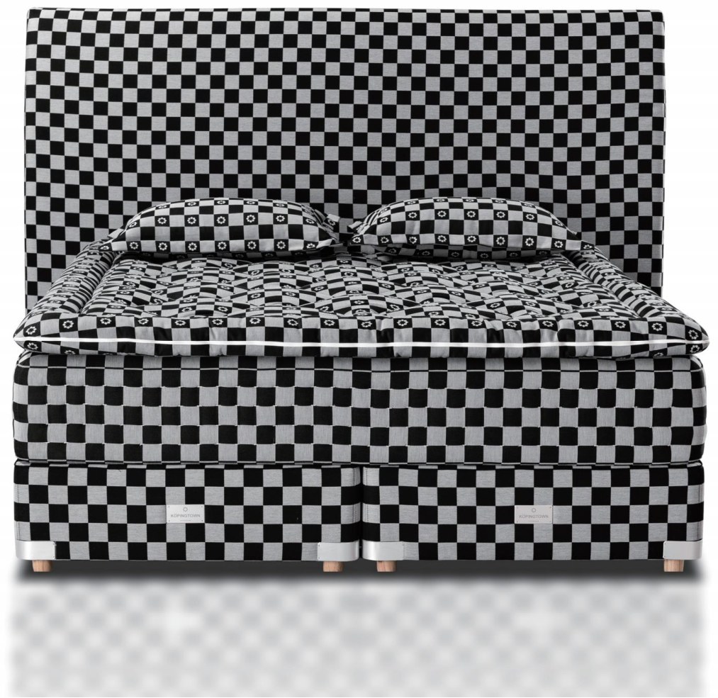 Stardust Noir handcrafted mattress and headboard in the signature black-and-white checkerboard