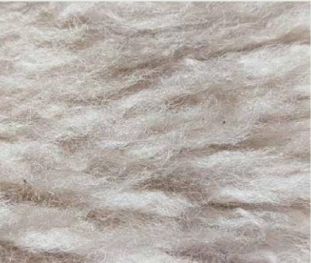 Wool fibres carded into soft loft layers
